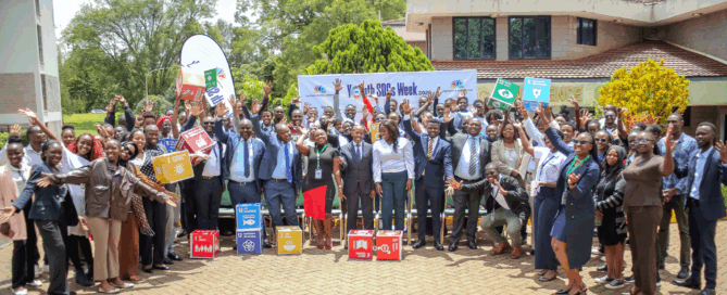 Group photo of Youth for SDGs Week 2026 participants gathered outdoors in Nairobi, Kenya, holding SDG-themed signs.
