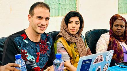 Man and woman sitting at the table smiling